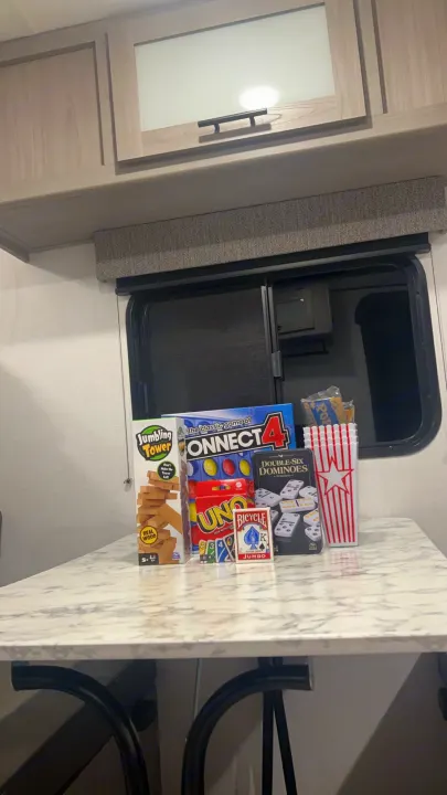 Ready for fun in an rv rental! Classic games like Jumbling Tower, Connect 4, UNO, & Dominoes are on a tabletop.. Coleman Lantern 17B 2024