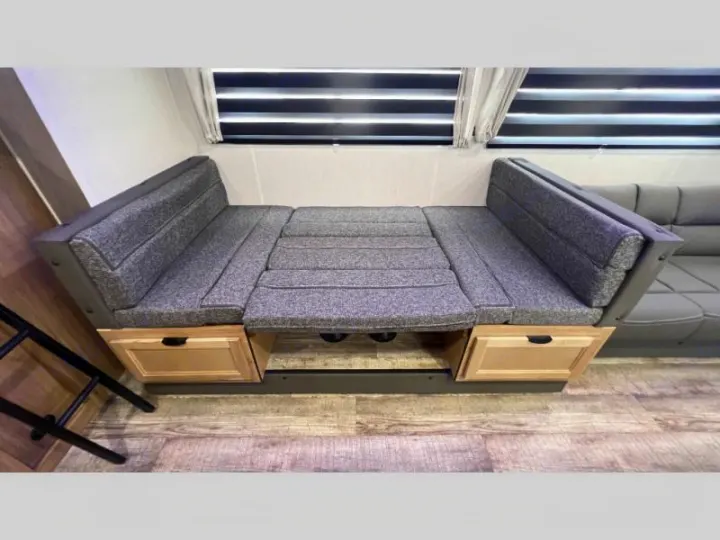 RV rental with versatile convertible sofa/dinette & storage drawers. Perfect for relaxing or sleeping.. Forest River Cherokee Grey Wolf 2024