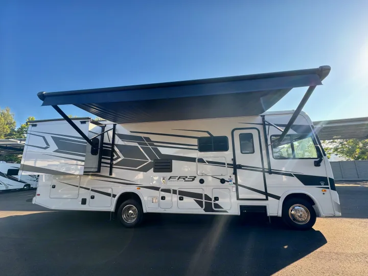 This white Forest River FR3 motorhome, featuring an extended slide-out and awning, is ready for your next rv rental adventure.. Forest River Fr3 2021