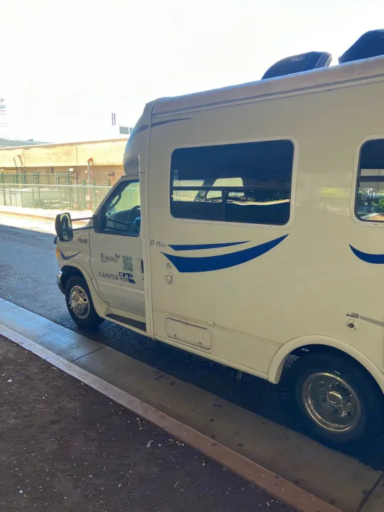 White Oahu Camper Van rv rental, a parked motorhome for your adventure.. Ford Econoline 2004