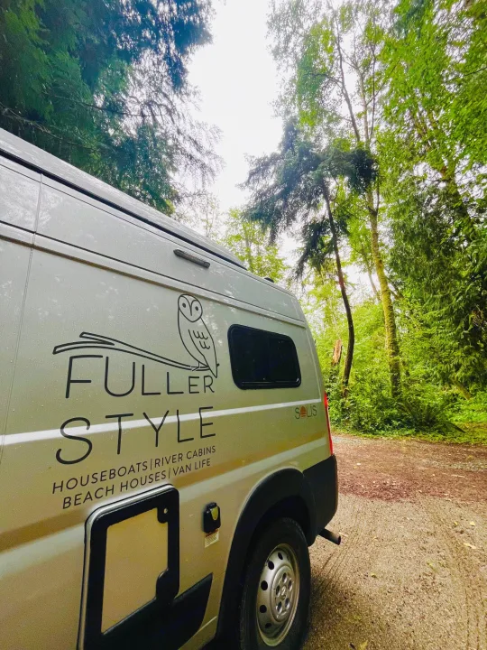 Fuller Style Solis RV rental in a vibrant forest. Perfect for van life adventures, including houseboats, river cabins, & beach houses.. Winnebago Eurovan Camper Eurovan Camper 2023