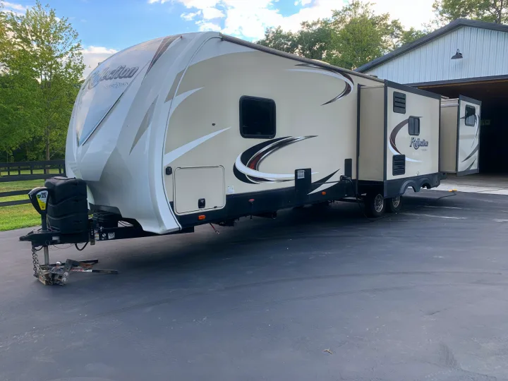 RV rental: A large Grand Design Reflection travel trailer, with slide-outs, ready for camping adventures.. Reflection BHT33 2018