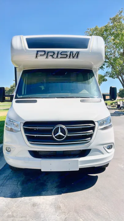 White Mercedes-Benz Prism RV motorhome, perfect for your next rv rental or camping road trip adventure.. Coachmen Prism 2024
