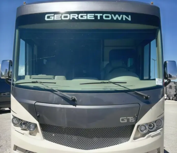 Front view of a Georgetown GT5 motorhome RV rental with a noticeable crack in the windshield.. Forest River Other 2021