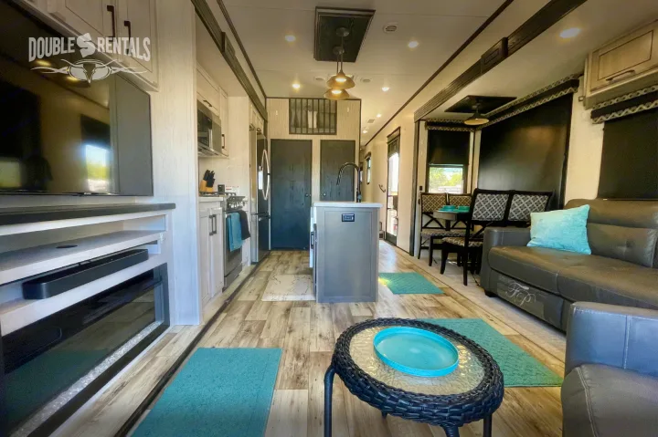 Spacious RV rental interior: modern kitchen, living, and dining areas create a comfortable home on wheels.. KZ Durango Gold 2022