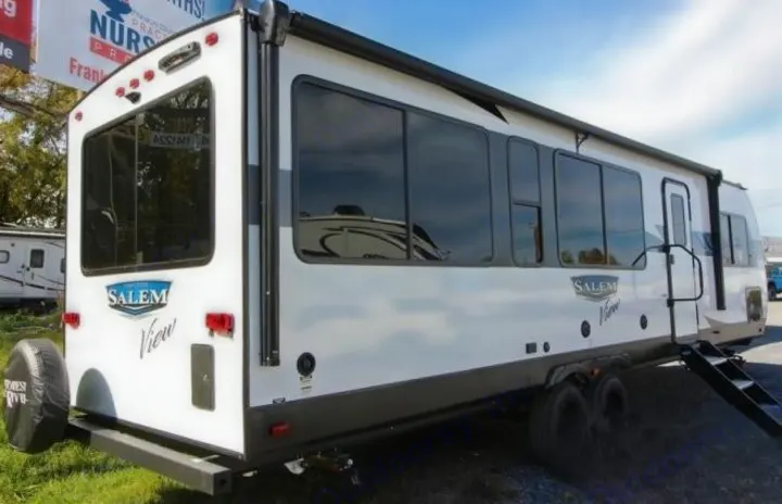 White Salem View travel trailer, an excellent RV rental option with spacious tinted windows, ready for your next adventure.. Forest River Salem 2024