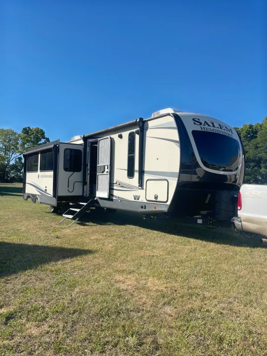 Spacious Salem Hemisphere RV rental ready for adventure, parked with slide-outs extended on a sunny day.. Forest River Salem Hemisphere 2020