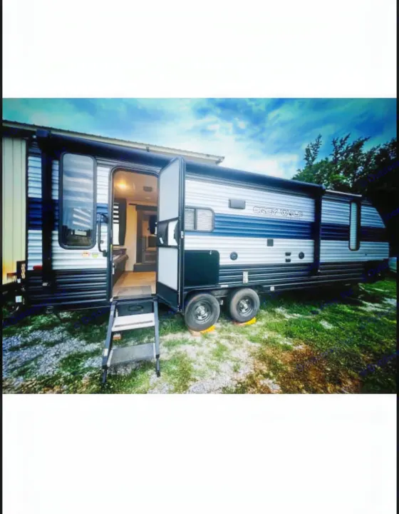 Spacious Grey Wolf travel trailer, door open with steps, ready for your next rv rental adventure.. Forest River Cherokee Grey Wolf 2020