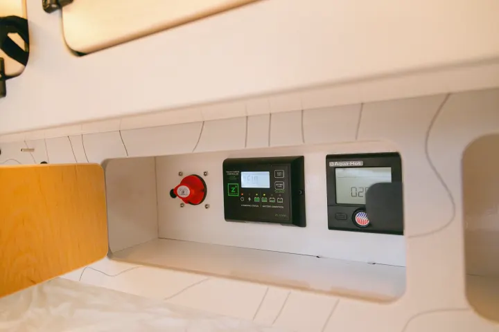 RV rental's power management: Zamp Solar controller, battery switch, and Aqua-Hot display.. Escapod Topo 2 Voyager 2024