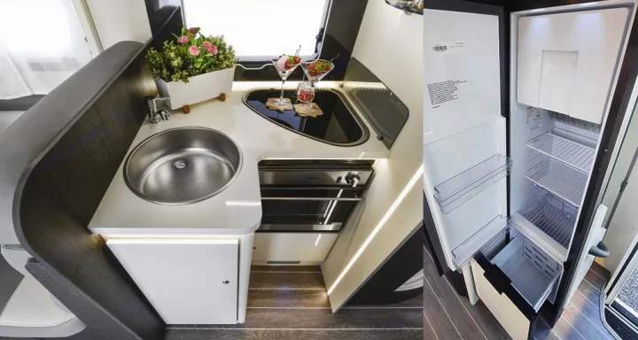 This RV rental features a well-equipped kitchen with a sink, integrated stove/oven, and large refrigerator.. Roller Team 696 2024
