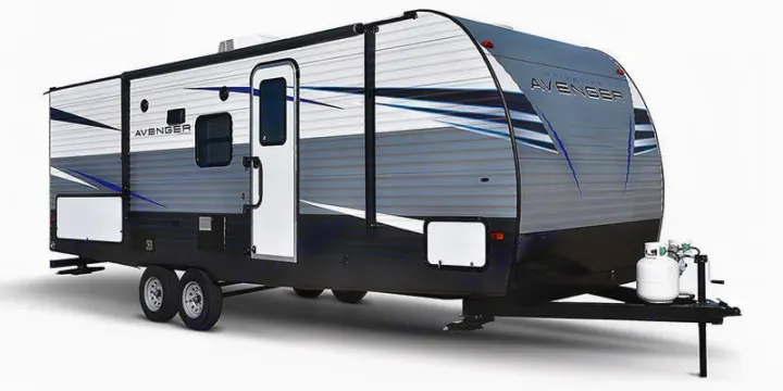 Modern gray and white travel trailer, ideal for your next RV rental adventure or camping trip.. Prime Time Avenger - 17BHS 2022