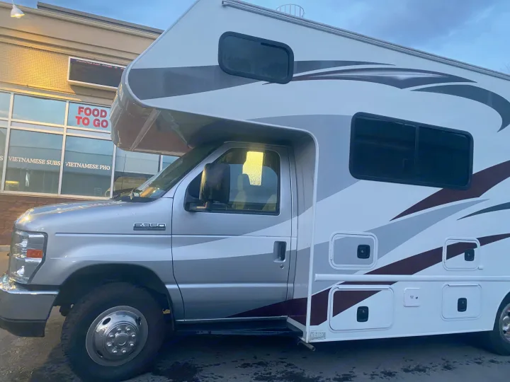Spacious Class C RV rental parked outside a Vietnamese restaurant, ready for a road trip adventure.. Adventurer Adventurer Motorhome 2017