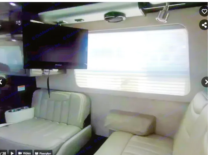 Step inside this RV rental's luxurious lounge: plush seating, entertainment TV, and window blinds for comfort.. Airstream Interstate 2014
