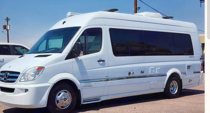 White Mercedes-Benz Sprinter Airstream RV rental, a sleek Class B motorhome perfect for your next adventure.. Airstream Interstate 2014