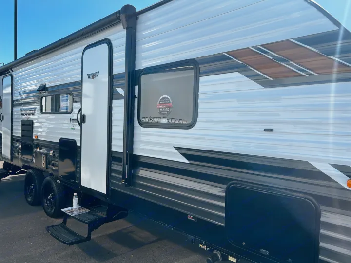 Side view of a new Wildwood X-Lite RV, perfect for your next rv rental adventure.. Forest River Wildwood X-Lite 2022