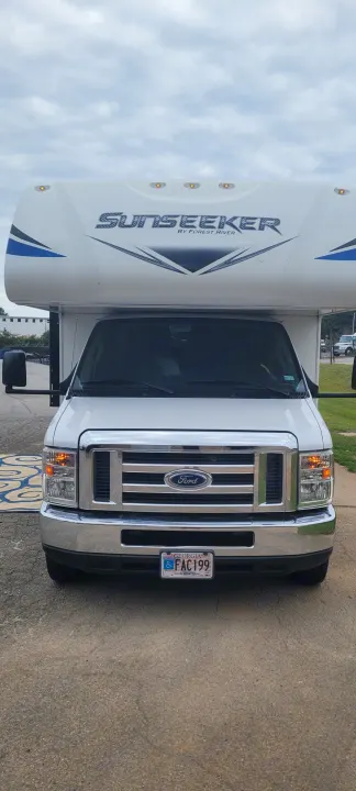 Front view of a white Sunseeker RV rental with a Ford chassis, a Class C motorhome ready for travel.. Forest River Sunseeker LE 2020