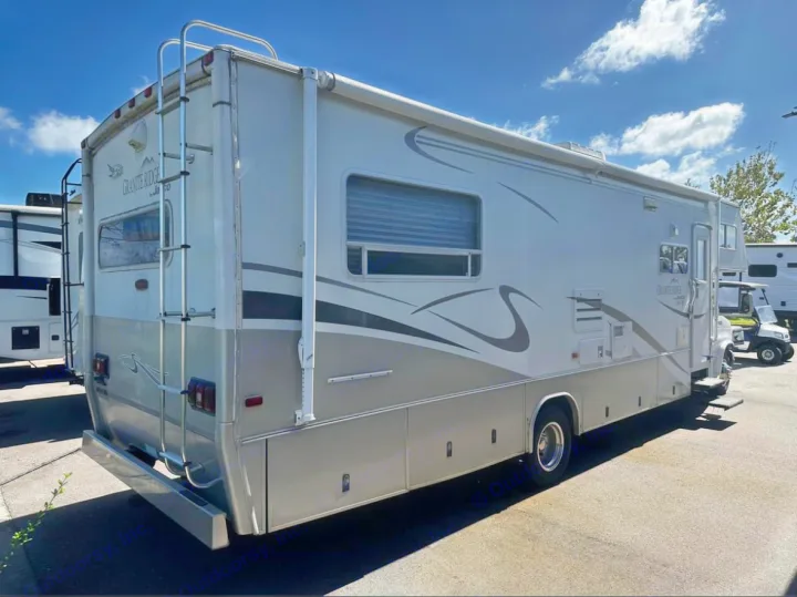 This spacious Jayco Granite Ridge motorhome is parked outdoors, ready for your next rv rental adventure.. Jayco Granite Ridge 2003