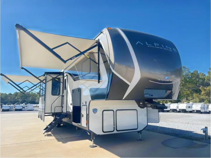 Spacious Alpine fifth-wheel RV with extended awnings. Great for an RV rental adventure!. Keystone Alpine 2025