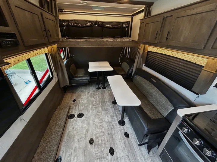 Step inside this versatile RV rental toy hauler, featuring a dinette, kitchen, and convertible living/sleeping space.. Forest River Shockwave 2021