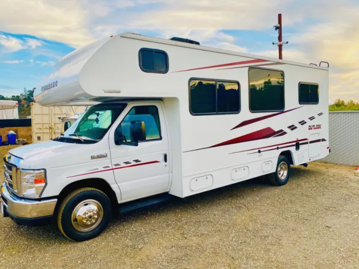 This white Winnebago Outlook Class C RV rental, on a Ford E-350 chassis, is ready for your next adventure!. Winnebago 25 2019