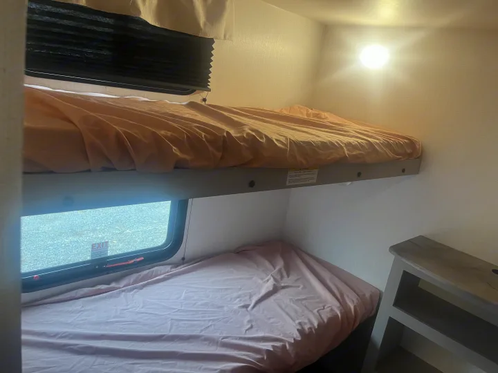 An RV rental bunk bed setup.. Heartland RVs Prowler Lynx 302 BHX 2025