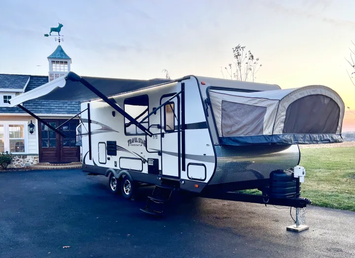 RV rental: This Travel Star travel trailer is parked on a driveway, awning extended, ready for adventure.. Starcraft Travel Star 2015