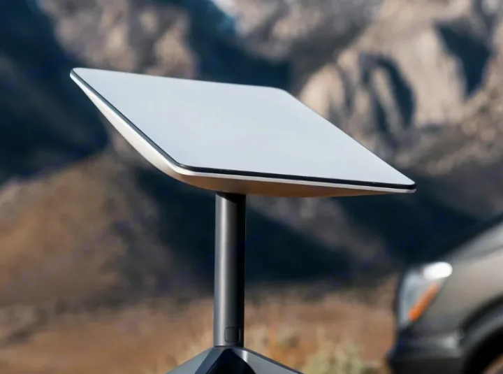 A white, square Starlink dish on a stand, offering satellite internet for your RV rental in remote areas.. Starlink Satellite 2025