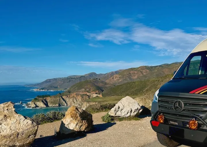 Experience epic Big Sur views! This Mercedes RV rental overlooks the Pacific Ocean, Bixby Bridge, and coastal mountains.. Storyteller Overland Storyteller Overland Class B 2023
