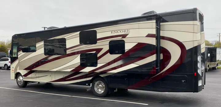 Luxury Encore by Coachmen RV motorhome in black, cream, and burgundy. Perfect for your next RV rental adventure.. Coachmen Encore 2022