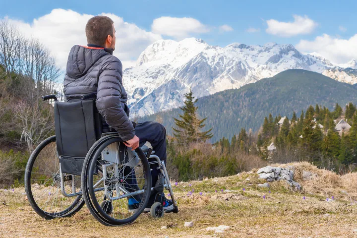 RV rental opens doors to breathtaking mountain views for wheelchair users, exploring nature's beauty and accessible travel freedom.. Four Winds Windsport 2001