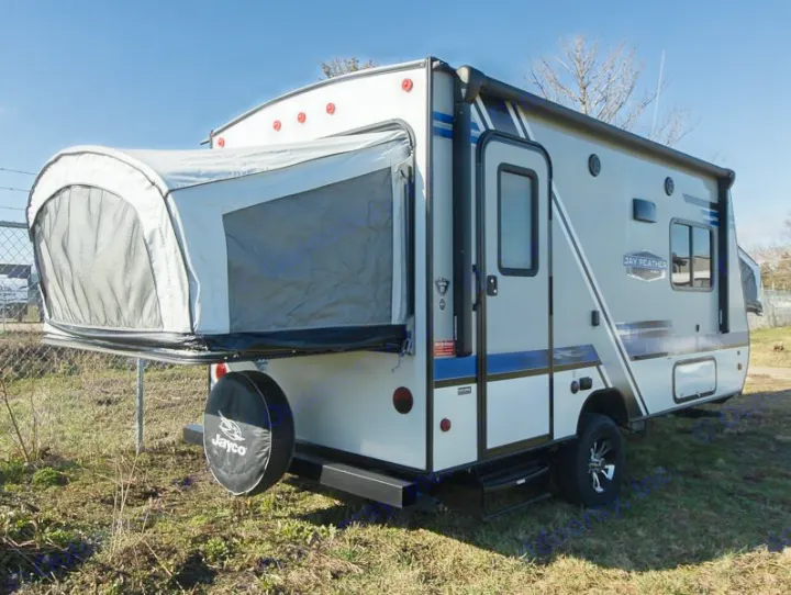 Jayco Feather RV rental: light gray travel trailer with pop-out bed, ideal for camping.. Jayco Jay Feather 2018