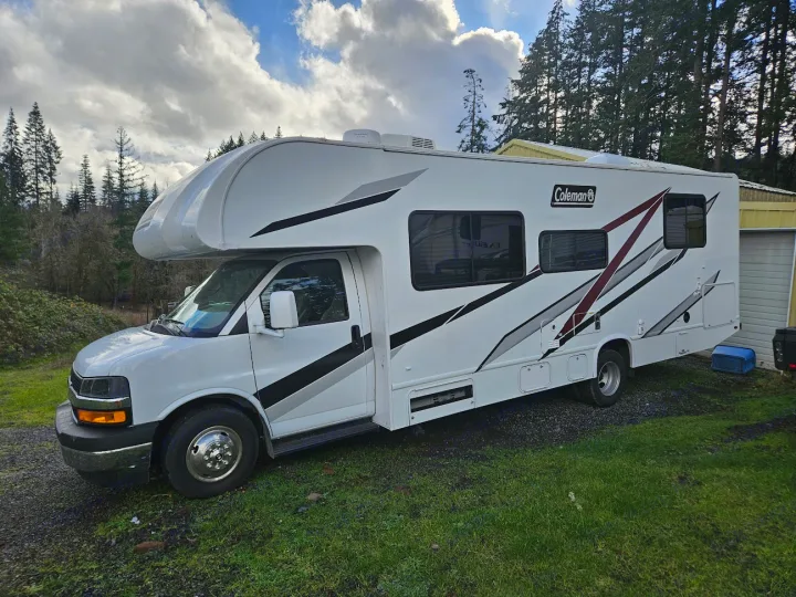 This white Coleman RV is perfect for your next adventure. Explore the outdoors with this spacious RV rental.. Thor Coleman 28AMC 2024