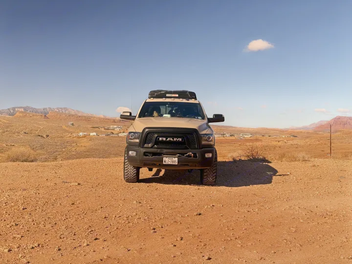 Adventure awaits! This off-road truck with a rooftop tent is your ideal RV rental for exploring desert landscapes.. Dodge Dodge 1 Ton Pu 2018