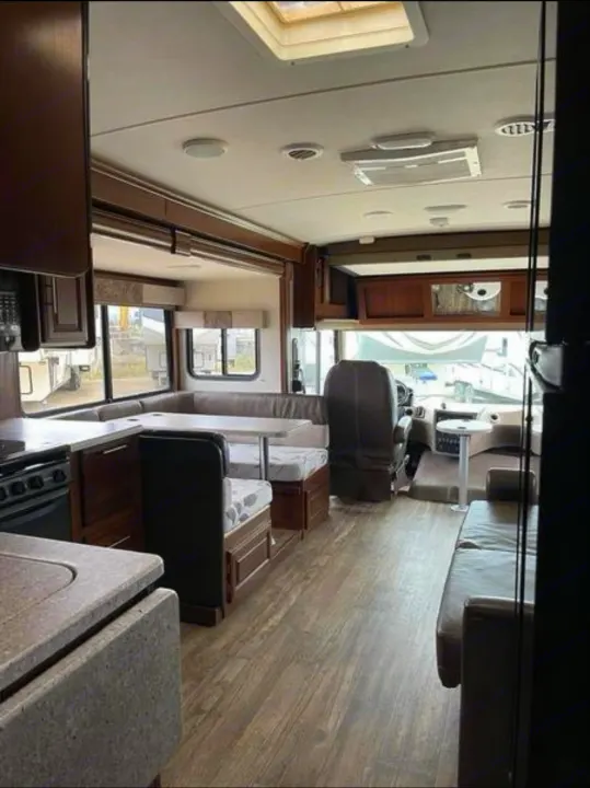 RV rental with a modern interior. Features kitchen, U-shaped dinette, sofa, and driver's area for comfortable travel.. FR3 FR3 Motorhome 2017