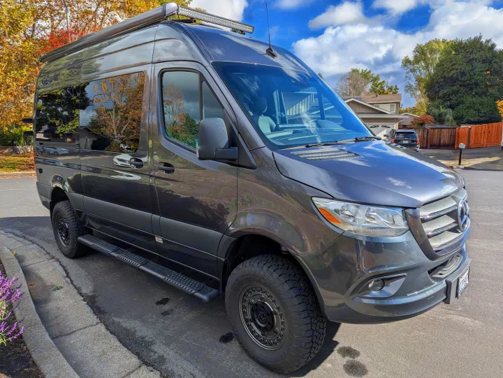 Stylish gray Sprinter camper van ready for your RV rental adventure. Equipped for off-road travel.. Thor Sanctuary 2022