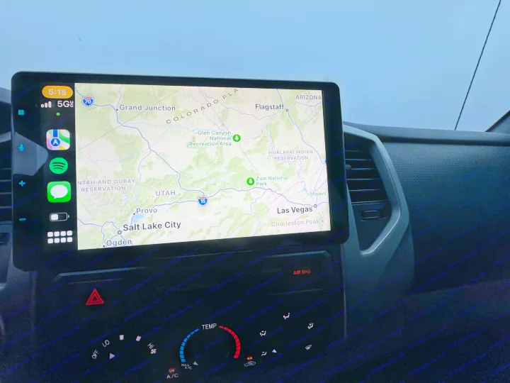 RV rental interior: Navigating a road trip with a large display showing a map of the Southwest US.. Adventurer 2015 Tacoma 2024
