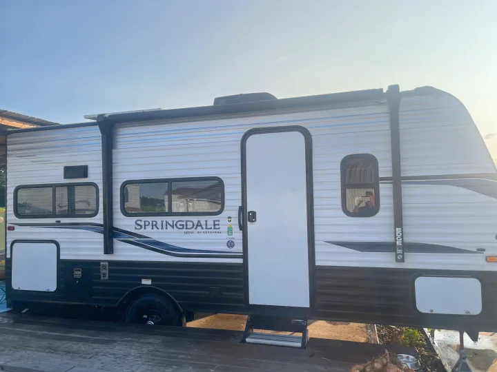 This Springdale Mini travel trailer, ideal for an RV rental, is ready for your next outdoor adventure and camping trip.. Keystone RV Springdale 2022