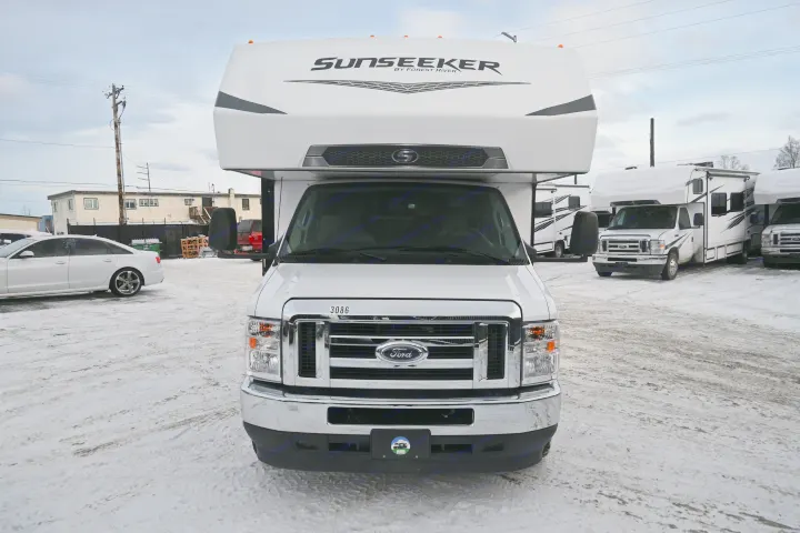Front view of a white Sunseeker RV from Alaska RV Rentals, parked on snowy ground. Ready for your next RV rental.. Forest River Sunseeker - LE Series M-2850S 2024