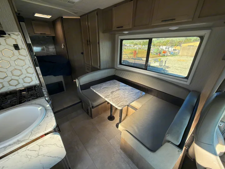 Explore this spacious RV rental with a modern kitchen, comfortable dinette, and rear bedroom. Enjoy scenic views!. 1HAGGUC78MN008793 Cross Trail 2022