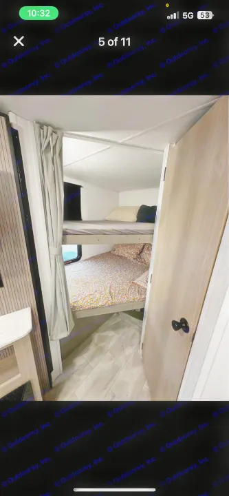 This RV rental offers a cozy, functional bunk bed sleeping area, ideal for families on road trips.. Dutchmen Kodiak SE 2024