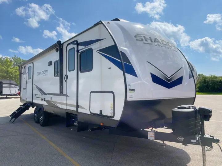 This sleek white Shadow Cruiser RV rental, with modern graphics & extended steps, is ready for your next road trip adventure.. Cruiser RV Shadow Cruiser 2025