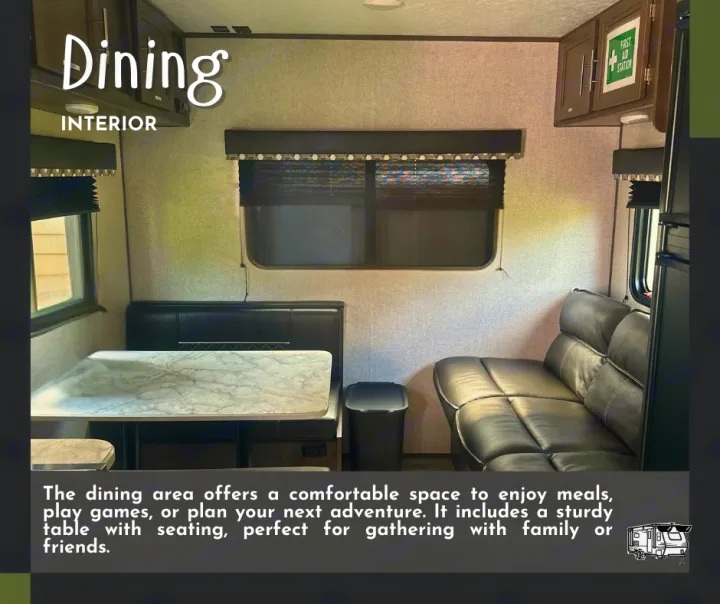 Comfortable RV rental interior with dining booth and lounge seating.. Dutchmen Coleman Lantern LT 2021
