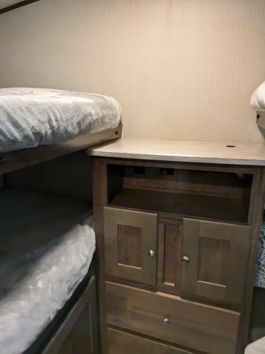 RV rental with comfy bunk beds and smart built-in storage/charging station for convenient living.. Cruiser RV MPG Ultra Lite 2019