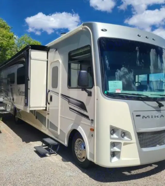 This cream & gray RV rental motorhome is ready for adventure!. Coachmen Mirada 2024