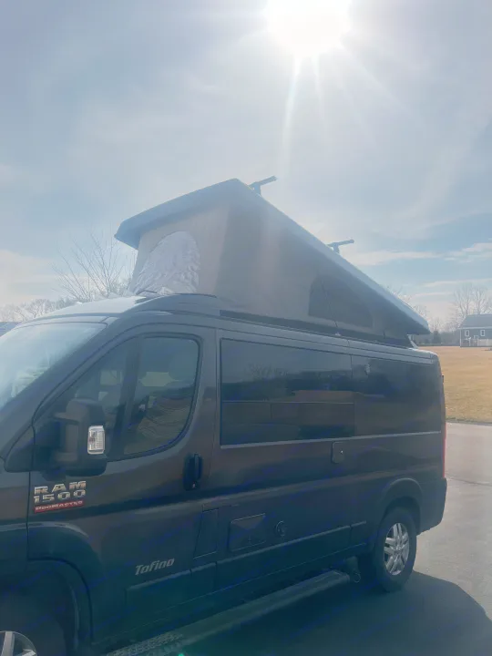 Dark Ram ProMaster camper van with extended pop-top, ideal for your next rv rental adventure.. Pleasure-Way Pleasure-Way Class B 2022