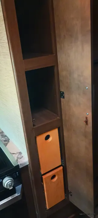 Smart storage in an RV rental! Open pantry with shelves and two convenient pull-out drawers.. Thor Motor Coach Chateau 2021