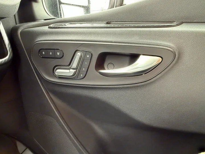 RV rental: Vehicle door panel featuring silver handle, seat memory, and door lock controls for driver convenience.. Winnebago Era 2020
