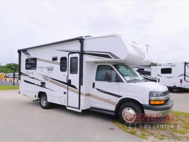 White Coachmen Freelander 55 Class C RV, with distinctive black and tan decals. Ideal for your next rv rental adventure.. Freelander 21QSS 2025