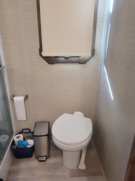 Modern, compact RV rental bathroom featuring. Entegra Accolade 2020