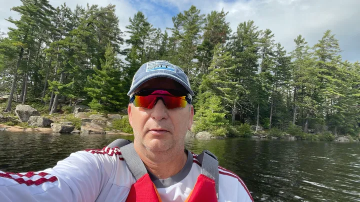 POV from a kayak on a calm lake, man in life vest. Imagine this view on your next RV rental trip!. Gulf Stream Grand River 22Mb 2024